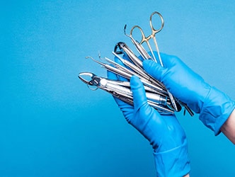 What kind of gloves are required in dentistry?